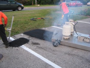 Repairing a pothole using infrared asphalt repair technology