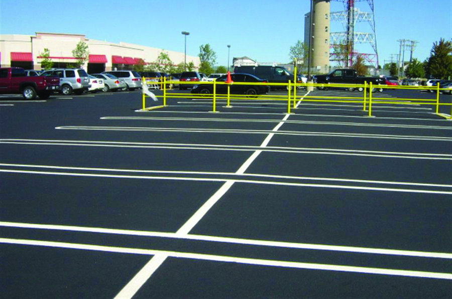A parking lot that has been freshly sealed and striped makes a great first impression!