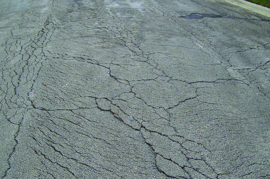 An image of Slippage Cracks in Pavement